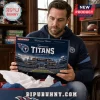 Tennessee Titans Monopoly Collector Edition Board Game box held by a man wearing a navy blue Titans hoodie in a study.