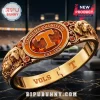 Tennessee Volunteers Gold Plated Mascot Hinged Bracelet featuring an orange oval stone, hound dog motifs, and T logo.