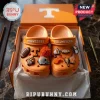Tennessee Volunteers Orange NCAA Crocs with charms featuring football, megaphone, and team logo emblems inside a gift box.