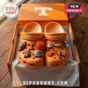 Tennessee Volunteers Orange NCAA Crocs With Charms featuring team logos, footballs, and helmets in an orange shoebox.