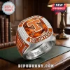 Tennessee Volunteers stainless steel championship ring featuring an orange T logo, crystal accents, and polished metal.