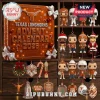 Texas Longhorns 2026 Christmas Figure Advent Calendar featuring orange box and vinyl character ornaments on wooden shelves.