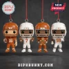 Texas Longhorns 2026 Christmas Figure Advent Calendar featuring four football player figurines with helmets on red strings.