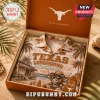 Texas Longhorns Bevo Mascot Hawaiian shirt in a gift box with tropical palm trees, a hut, and surfing graphics.