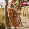 Texas Longhorns Bevo Mascot Hawaiian shirt featuring tropical palm tree, beach shack, and coastal signage patterns.