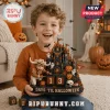 Texas Longhorns Sculpted Resin Halloween Countdown Calendar held by a smiling child with ghosts, a castle, and pumpkins.