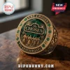 The Chosen 7th Anniversary Crystal Ring featuring a deep green stone, gold filigree, and intricate biblical motifs.