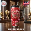 The Dolphins Rugby League 3rd Anniversary YETI Tumbler with red and white tie-dye pattern, handle, and straw on a desk.