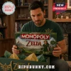 The Legend of Zelda Monopoly Collector Edition Board Game held by a man wearing a dark green shirt in a living room.