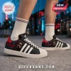 The Weeknd x Adidas After Hours Black Casual Sneakers featuring custom graphic prints, white stripes, and rubber soles.