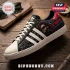 The Weeknd x Adidas After Hours black casual sneakers featuring custom singer portrait, panther graphic, and white toe cap.