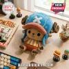 Tony Tony Chopper One Piece Stuffed Plush Toy wearing a signature blue hat with a white cross on a beige desk surface.