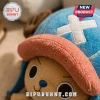 Tony Tony Chopper One Piece stuffed plush toy wearing his iconic blue hat with a white cross and fuzzy pink brim.
