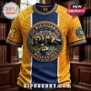 University of Michigan Wolverines NCAA Mascot T-Shirt in blue and maize yellow with detailed stadium and wolverine graphics.