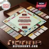 Washington Commanders Collector Edition Monopoly Board Game with burgundy, gold, and white team branding on a wooden table.