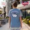 Washington Nationals Hello Kitty 2026 Blue Baseball Jersey worn by a person, featuring a large Hello Kitty back graphic.