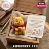Winnie the Pooh handmade felt pocket hug toy inside a wooden gift box with a printed card featuring a bee and honey pot.