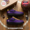 WNBA Teams All-Star Back 2 Black Nike Air Force 1 sneakers in purple and yellow leather on a hardwood basketball court.