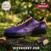 WNBA Teams All-Star Back 2 Black Nike Air Force 1 in purple and gold leather with a black swoosh on a mossy log surface.