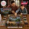 World of Warcraft Monopoly Collector Edition Board Game box and pieces laid on a table with a father and son playing.