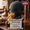 Xenomorph Crochet Emotional Support Plush Toy holding an orange kitten, featuring a sign with text on a wooden surface.