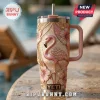 Yeti Flamingo Floral 40oz Stanley Tumbler featuring embossed pink flamingo and tropical flower pattern on a glittery finish.