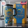 Yeti Los Angeles Chargers 66th Anniversary Tie-Dye YETI Tumbler with blue and yellow branding next to a matching box.