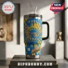 Yeti Los Angeles Chargers 66th Anniversary tie-dye tumbler with team logo and 1960-2026 text on a metal display stand.