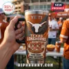 YETI Texas Longhorns 133rd Anniversary tumbler with white Longhorn logo, orange swirl graphics, and text on steel surface.