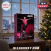 Yungblud 2026 Holiday Advent Calendar featuring a black box with Yungblud imagery, set on a wooden table near a tree.