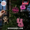 Yungblud 2026 Holiday Advent Calendar ornaments including a figure, star logo, pink glitter snow globe, and pink Y letter.