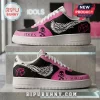 Yungblud Idols Skull Wings Air Force 1 Sneakers in black and pink with white wing graphics and skull insignias.