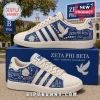 Zeta Phi Beta Howard University white blue sneakers featuring dove graphics, rose emblems, and text on a branded shoebox.