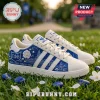 Zeta Phi Beta Howard University white blue sneakers featuring ZΦB shield logo and campus illustrations on grassy field.