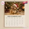Front view of December 2027 page for Funny Yorkshire Terrier Wall Calendar featuring a dog in a Santa hat.