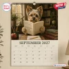 Front view of a 2027 Funny Yorkshire Terrier Wall Calendar featuring a dog wearing glasses and reading a book.