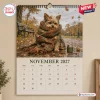 Front view of November 2027 page for Funny Yorkshire Terrier Wall Calendar featuring a dog wrapped in a scarf.