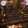 24 Days of Krampus Christmas Advent Calendar with twenty-four dark folklore figurines displayed on a tiered wooden stand.