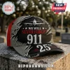 911 We Will Never Forget 25th Anniversary Cap featuring a black and gray airplane graphic with memorial text.
