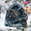 Front view of an Alien Predator Custom Christmas Ornament featuring a battle scene with stone arch background and customized text.