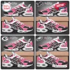All Team NFL x Crucial Catch Intercept Cancer Air Max Plus sneakers featuring pink, black, and white team-specific logos.
