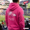 All Team NFL x Crucial Catch Pink Hoodie 2026 featuring the Baltimore Ravens logo and NFL shield on a stadium background.