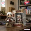 Front view of Altair Ibn-Laahad Assassins Creed 20th Anniversary Figure standing on stone display base next to its box.