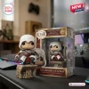 Front view of Altair Ibn-Laahad Assassins Creed 20th Anniversary figure standing beside its decorated display box.
