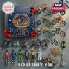 AMA Supercross 2026 Racing Miniature Advent Calendar featuring toy dirt bikes, racing gear, and rider figures on grey floor.