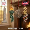 America 250 U.S. Semiquincentennial Patriotic 2026 Advent Calendar ornaments including a marble obelisk, torch, and seal.