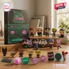 Ateez Golden Hour Part 5 Advent Calendar 2026 box with chibi member figurines, animal charms, and branded tokens on wood.