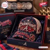 Distressed Atlanta Braves 2026 Champions cap in a branded presentation box.