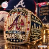 Closeup of Atlanta Braves 2026 NL East Champions ring featuring a team logo and stadium graphic.