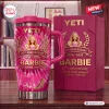 Front view of a pink Yeti tumbler with Barbie 67th anniversary graphics and matching gift box.